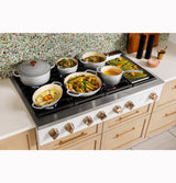 Caf(eback)(TM) 48" Commercial-Style Gas Rangetop with 6 Burners and Integrated Griddle (Natural Gas) - (CGU486P4TW2)